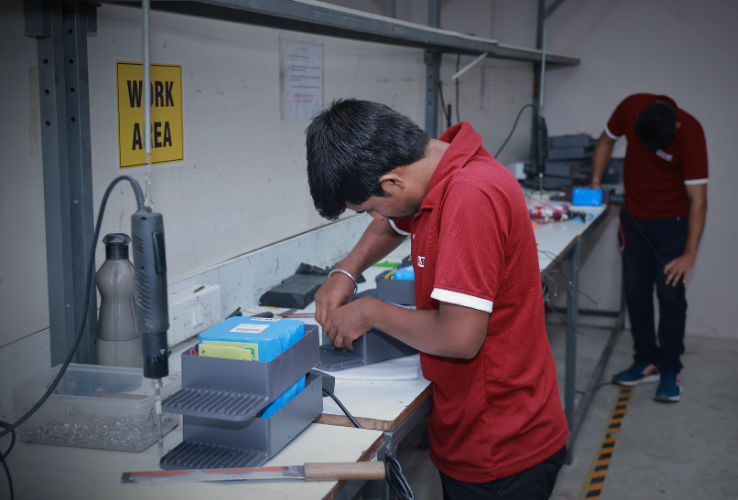 Team moving into the new state-of-the-art manufacturing facility